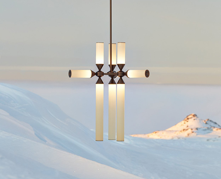 roll & hill castle pendant displayed against a snowy backdrop