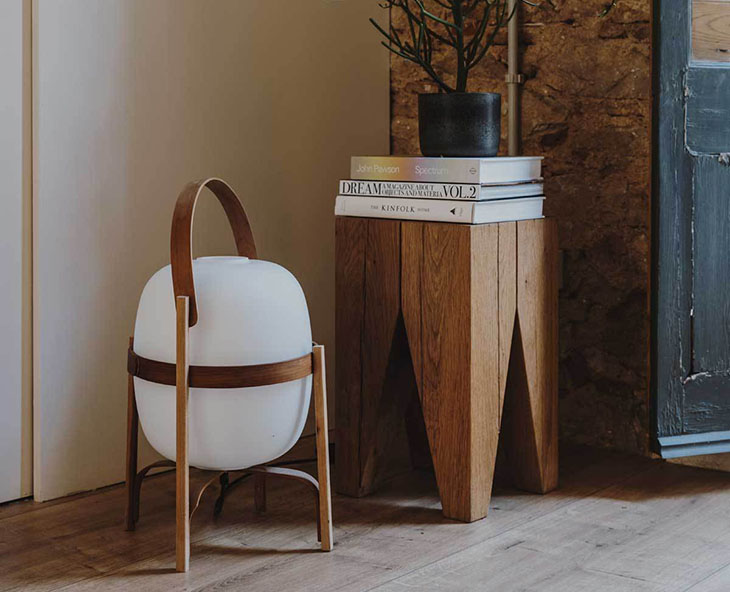 entryway featuring e15 backenzahn stool and santa & cole cesta lamp