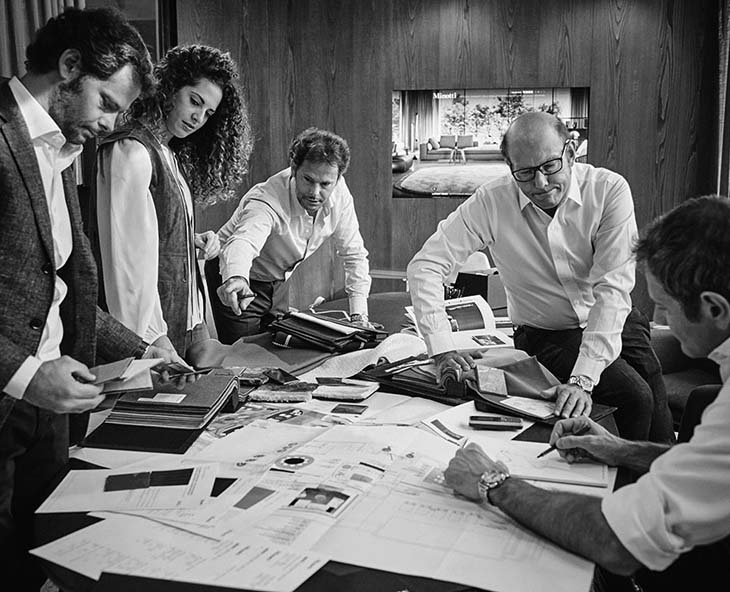 vintage photo of minotti family working together