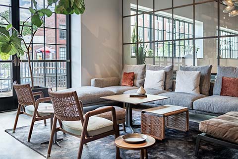 flexform romeo sofa and ortigia armchairs at studio como modern furniture showroom in denver