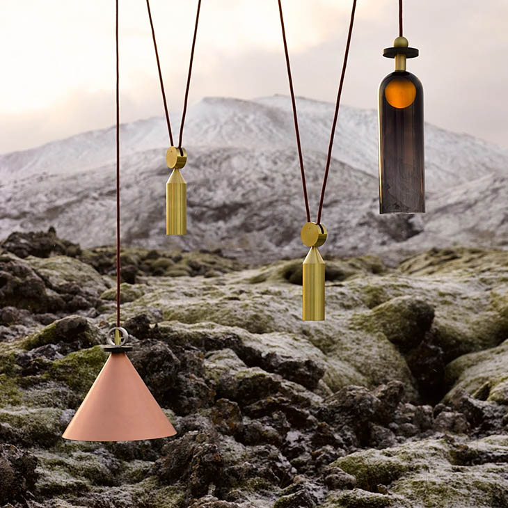 roll & hill shape up pendant in an outdoor setting near volcanic rock and mountains