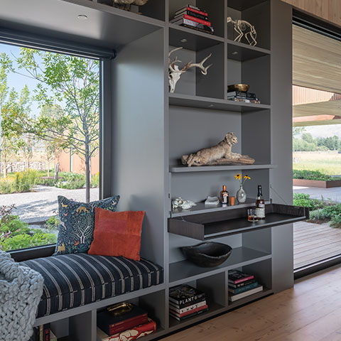 modern living room in jackson wyoming featuring a custom poliform wall system