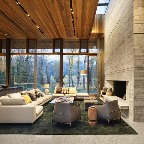 modern house in jackson wyoming featuring two poltrona frau archibald armchairs