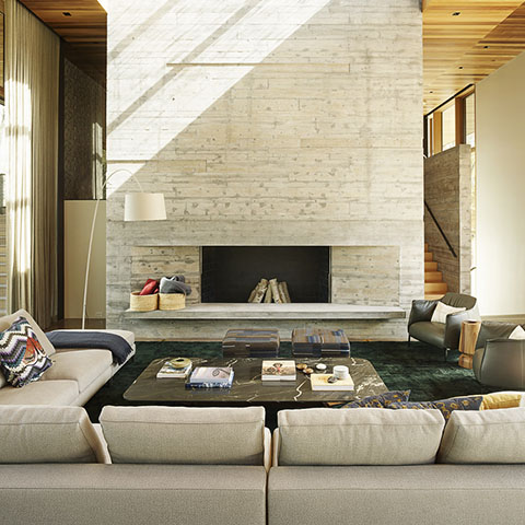 modern house in jackson wyoming featuring a poliform mondrian coffee table