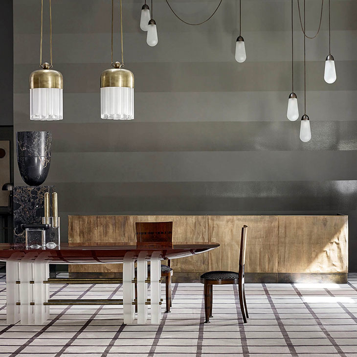 modern room featuring apparatus lariat pendant light installation