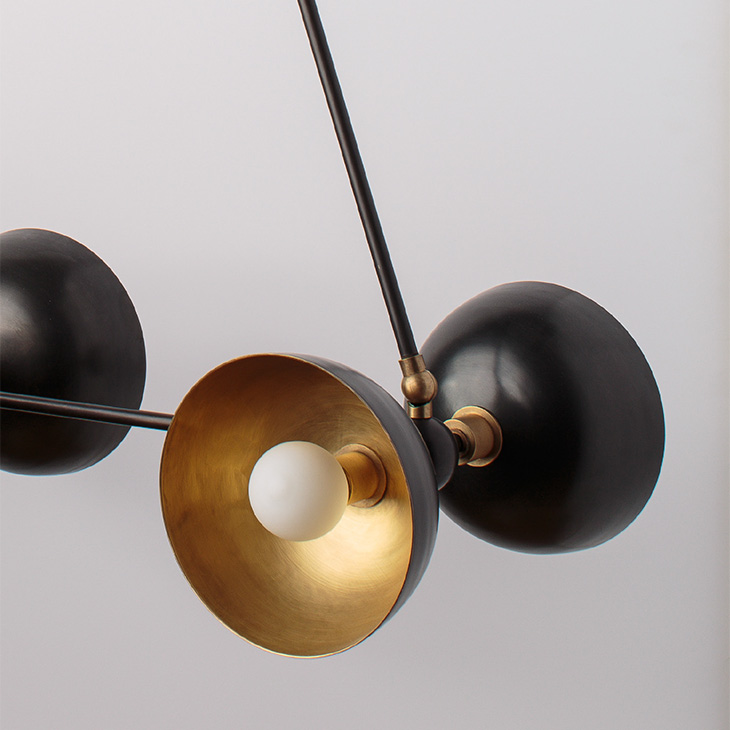 close up of apparatus trapeze pendant light