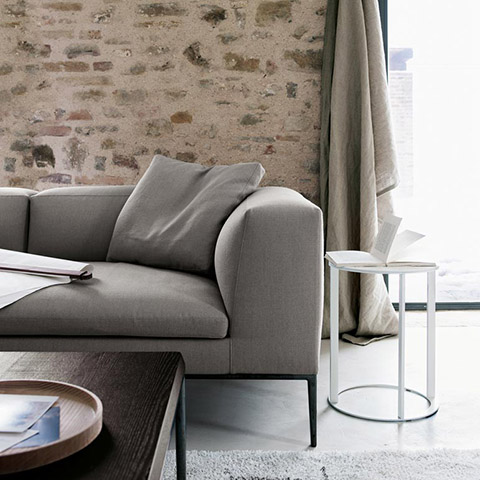 modern living room featuring b&b italia frank side table