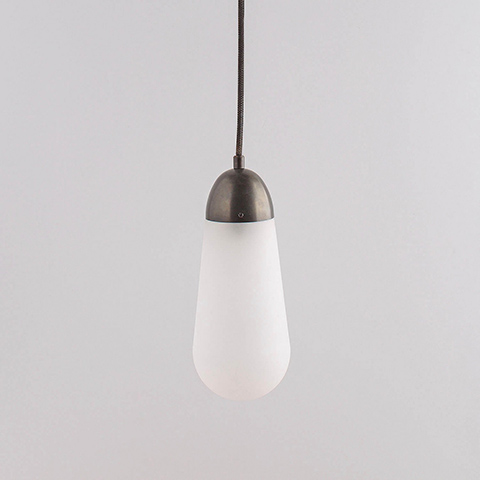 apparatus lariat pendant light on a soft grey background