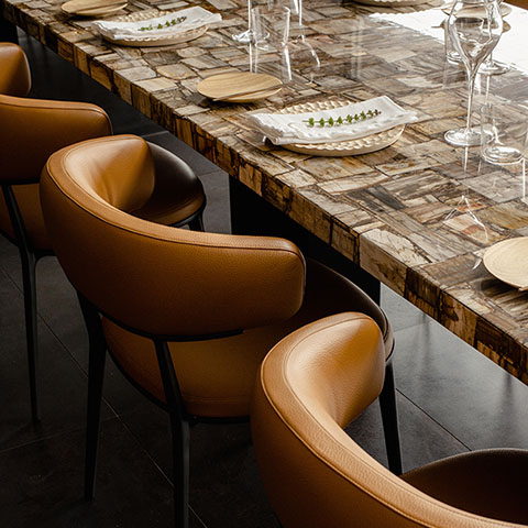 modern dining table with b&b italia caratos chairs