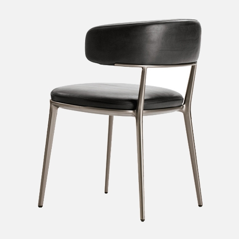 b&b italia caratos chair on a grey background
