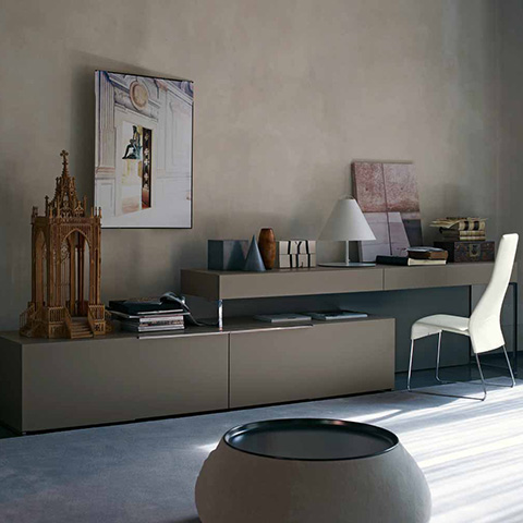 modern home office featuring a b&b italia fat fat ottoman