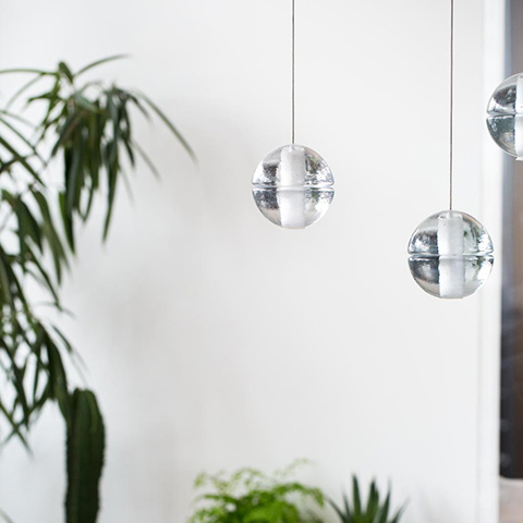 close up of three bocci 14.1 pendant lights