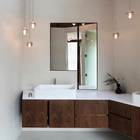 modern bathroom featuring bocci 14 series pendant lights