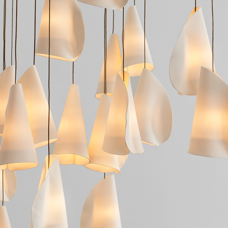 close up of porcelain forms of the bocci 21 series pendant light