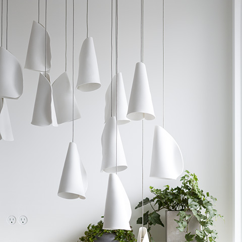 interior space featuring bocci 21 series pendant light