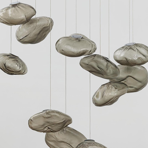 bocci 73 series pendant lights in grey on grey background