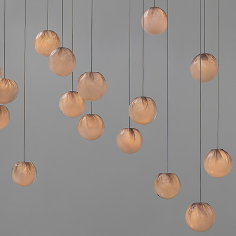 bocci 84 series pendant light on a grey background