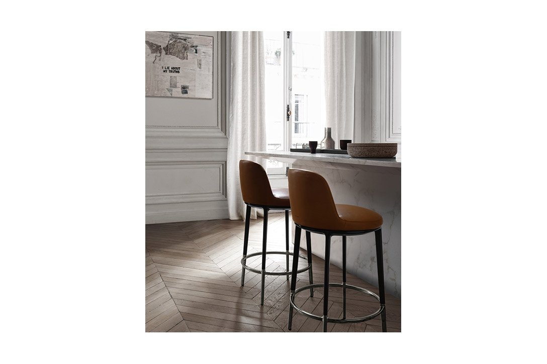 modern kitchen featuring b&b italia caratos stools
