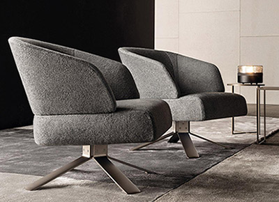 living room featuring a pair of minotti reeves armchairs