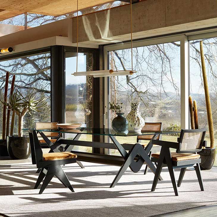 modern dining room featuring a cassina capitol complex dining table