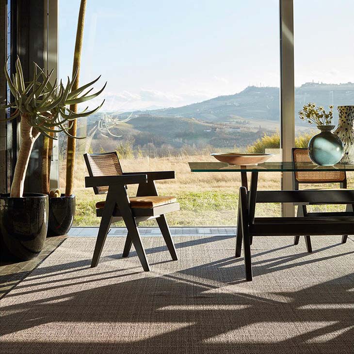 modern dining room featuring a cassina capitol complex dining table