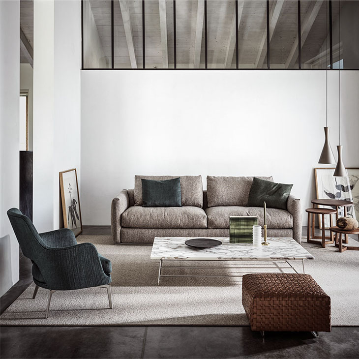 modern living room featuring a flexform bangkok ottoman