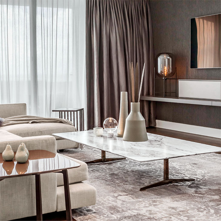 modern living room featuring a flexform fly coffee table