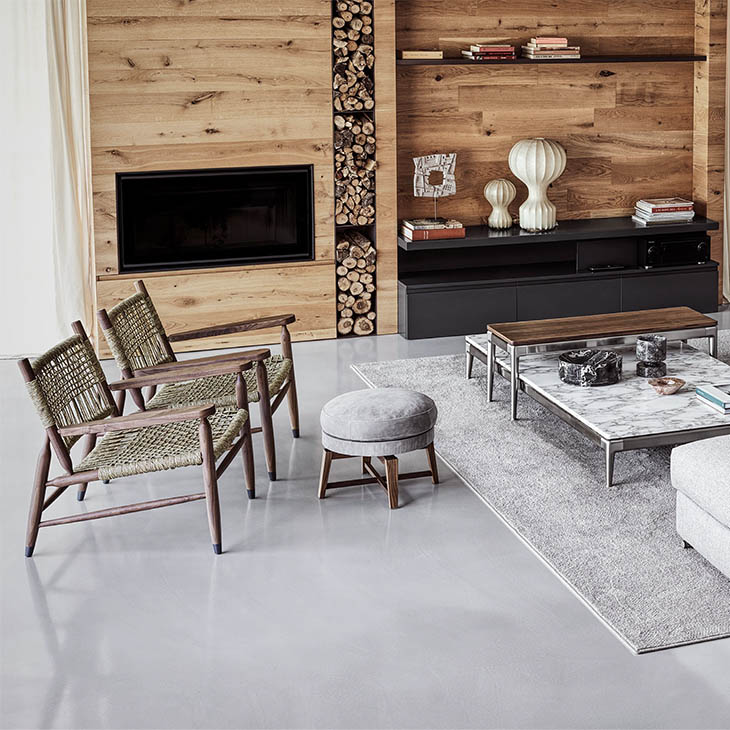 modern living room featuring two flexform tessa armchairs