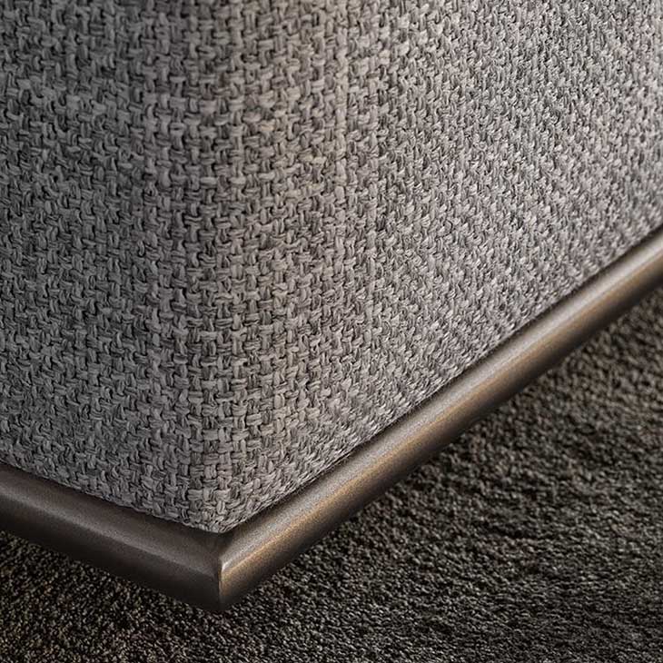 close up base of minotti hamilton sofa