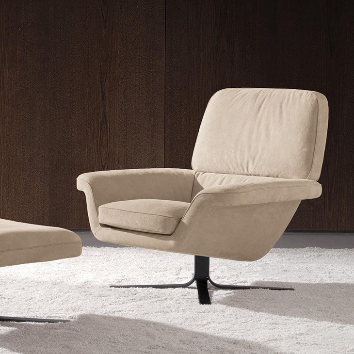 modern living room featuring a minotti blake-soft armchair