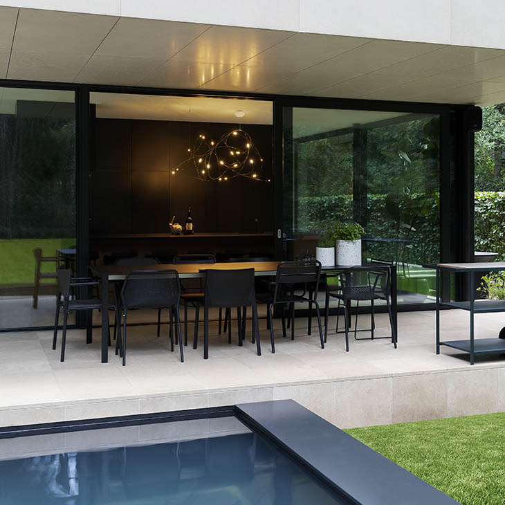 modern kitchen featuring moooi flock of light pendant