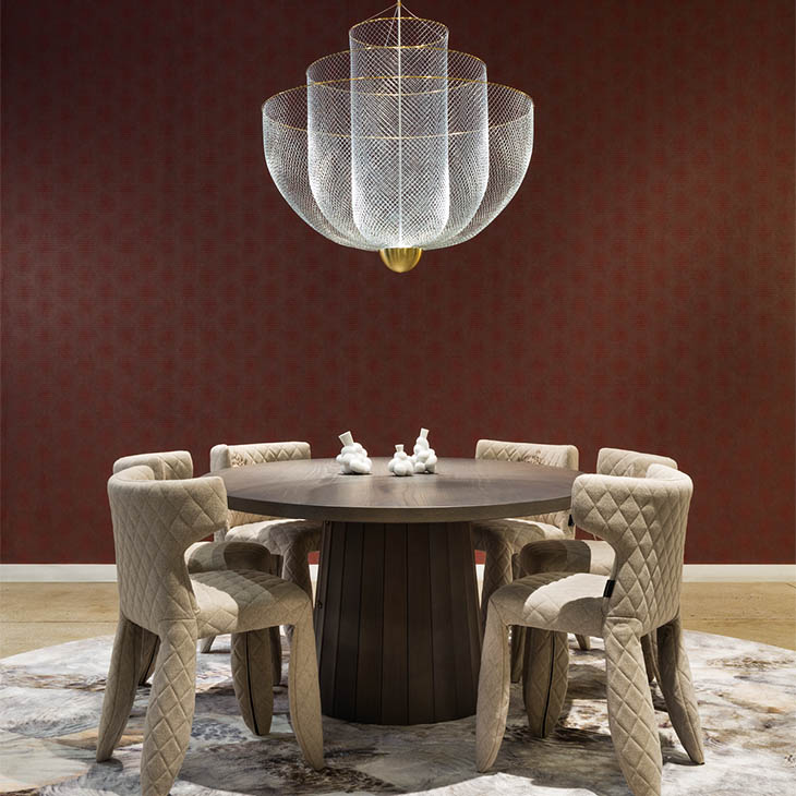 modern dining room featuring moooi meshmatics pendant light