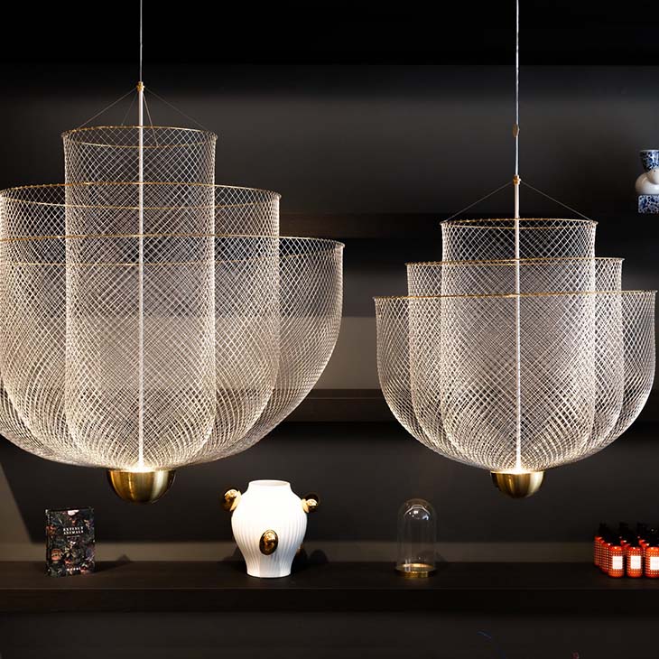 two moooi meshmatics pendant lights in a retail setting