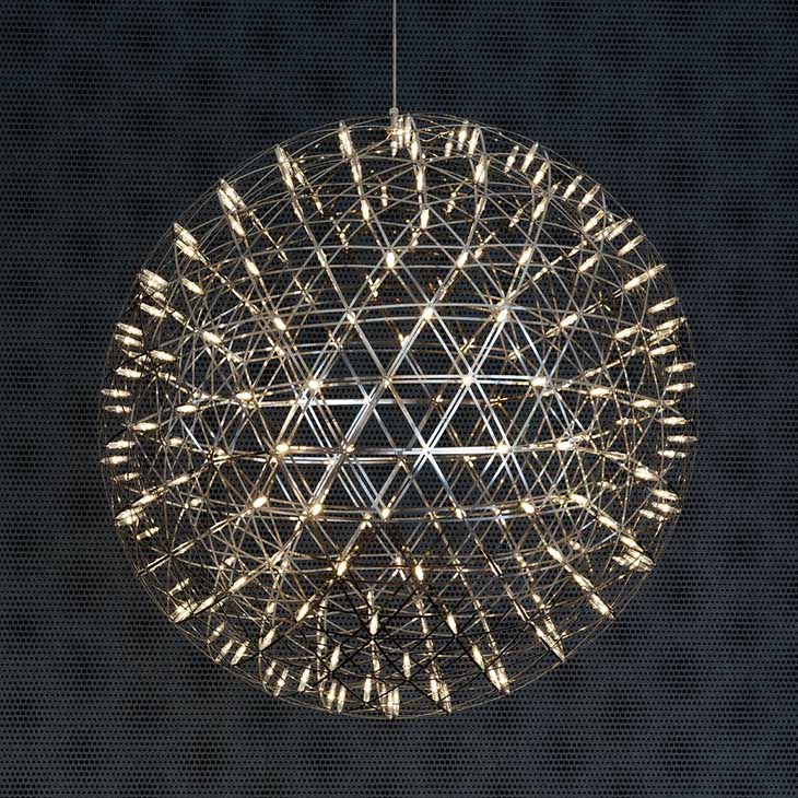 moooi raimond ii pendant light glowing in a dark room