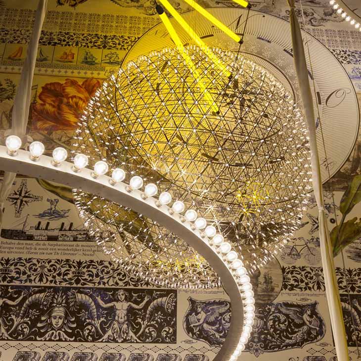 moooi raimond r127 pendant light clustered with other moooi pendants in a decorative room