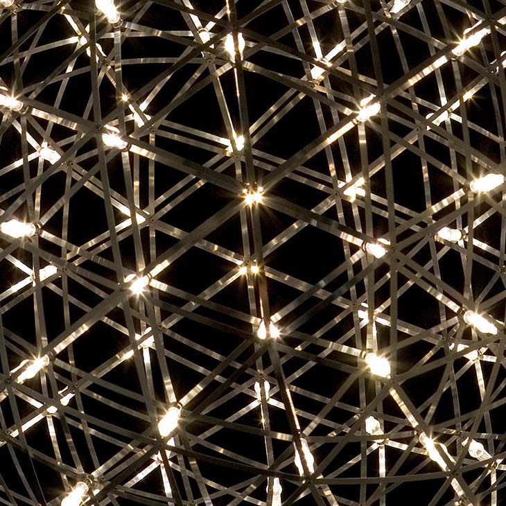 moooi raimond r127 pendant light glowing in a dark room