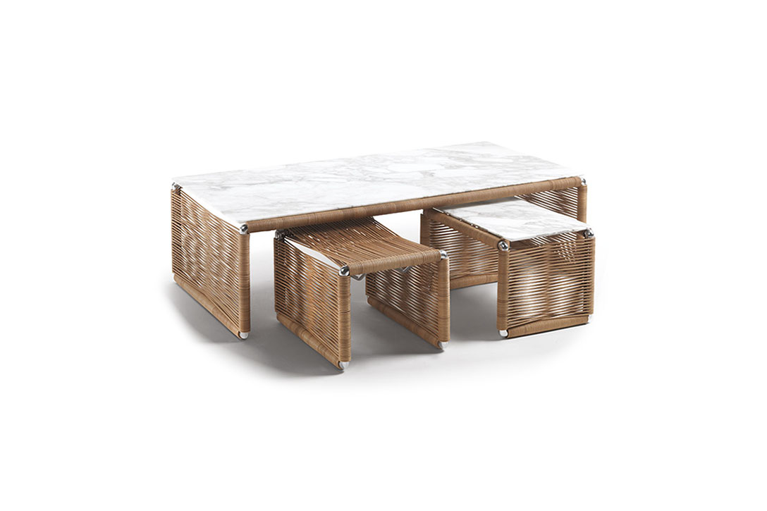 flexform tindari coffee table, ottoman, and side table on a white background