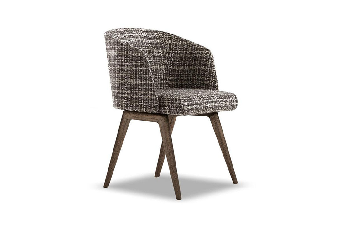 minotti reeves dining chair on a white background