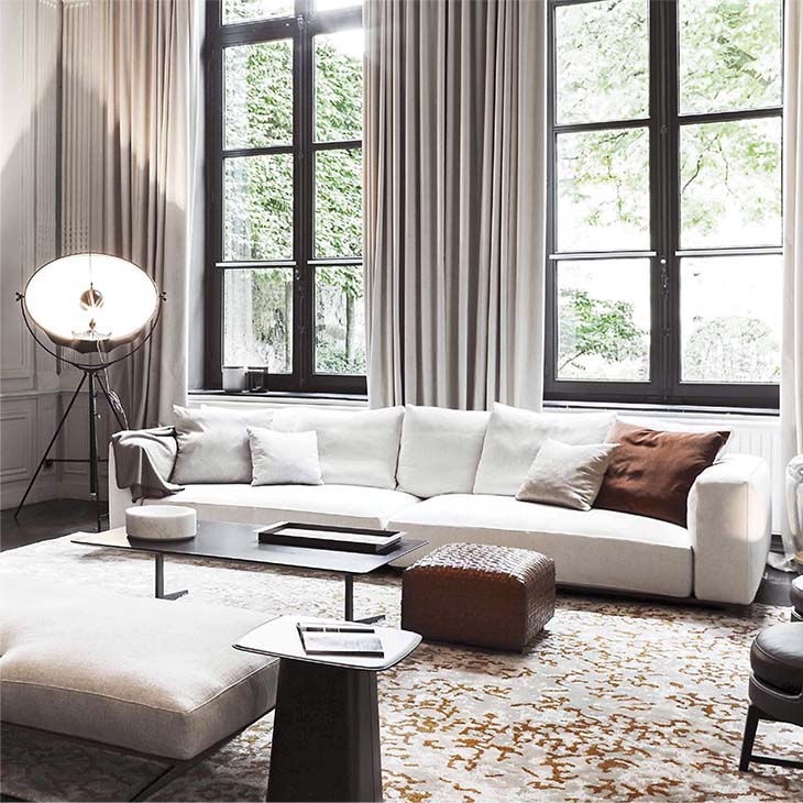 modern living room featuring a flexform bangkok ottoman