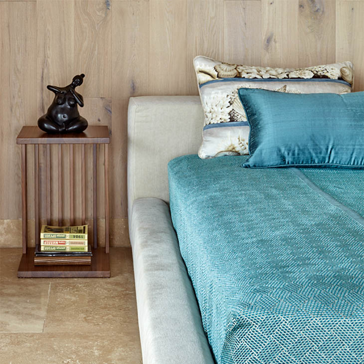 modern bedroom featuring a flexform vienna side table