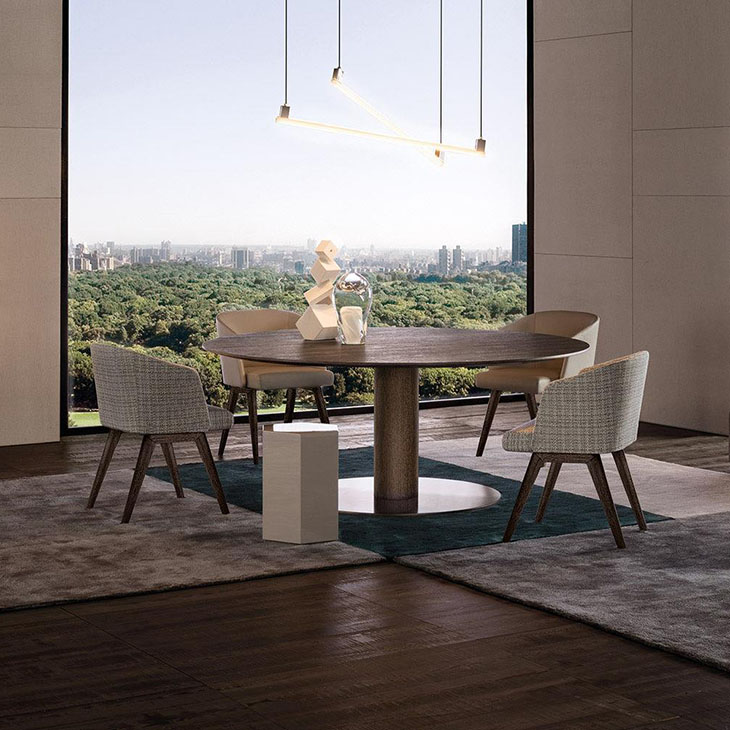modern dining room featuring a minotti bellagio dining table