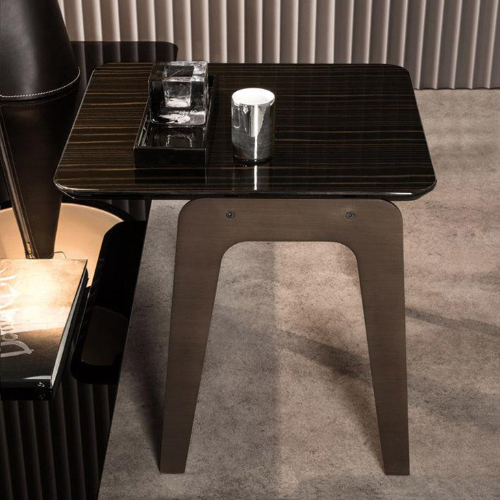 modern living room featuring a minotti kirk jut out top side table