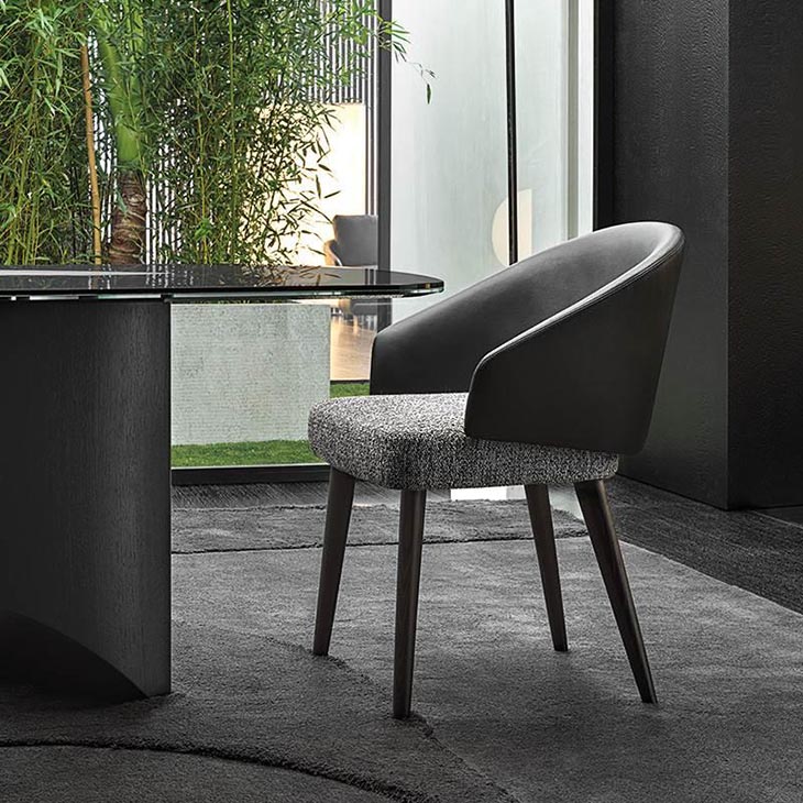 modern dining room featuring minotti lawson dining chair