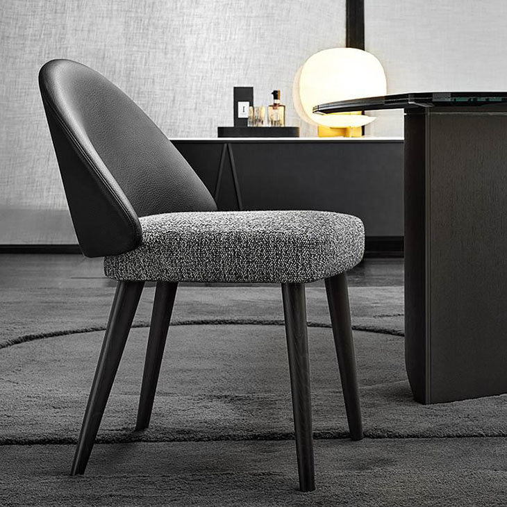 modern dining room featuring minotti lawson dining chair