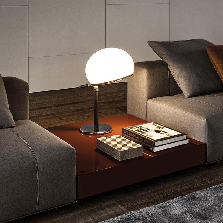 modern living room featuring a minotti ritter coffee table