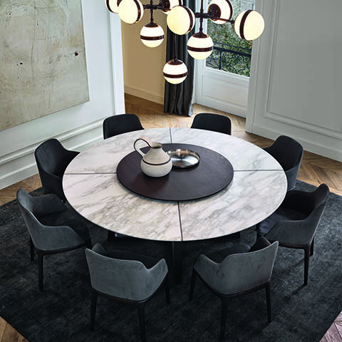 modern dining room featuring a poliform concorde dining table