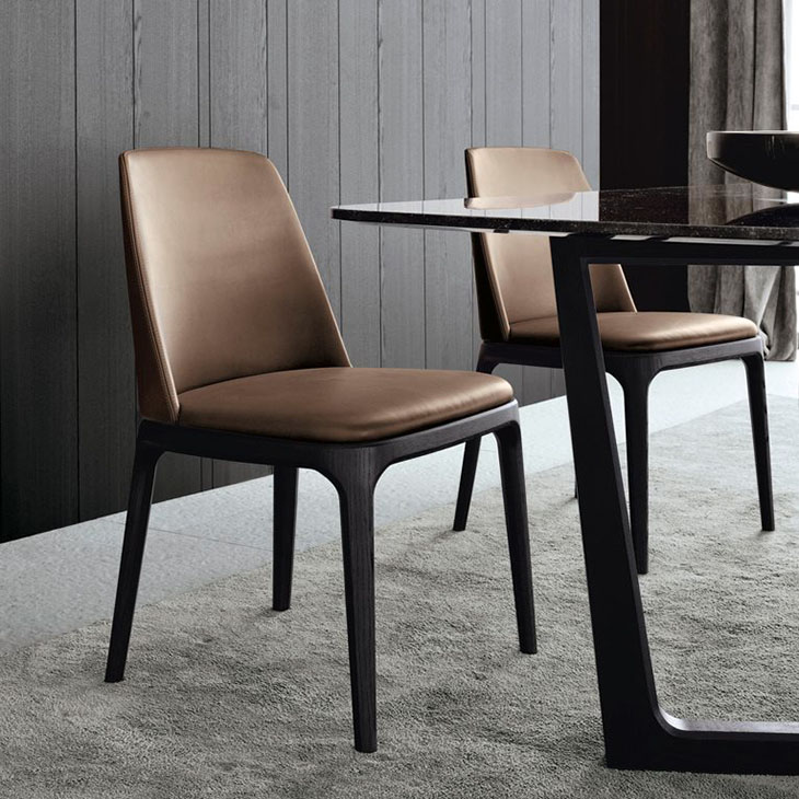 modern dining room featuring poliform grace dining chairs