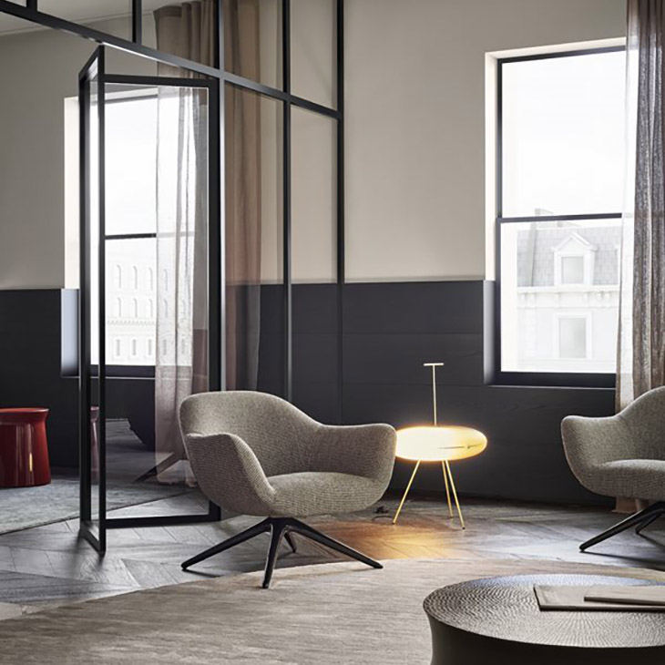two poliform mad armchairs in situ