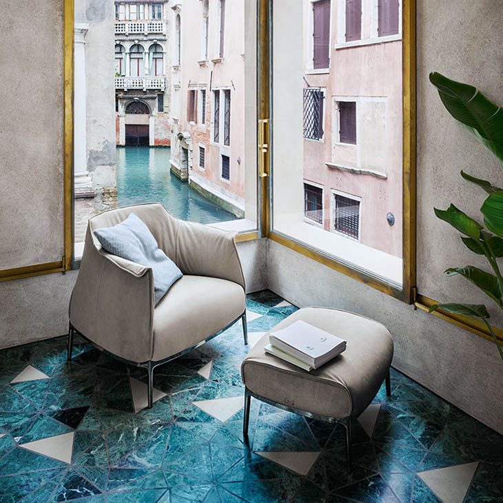 poltrona frau archibald gran comfort armchair and ottoman in situ