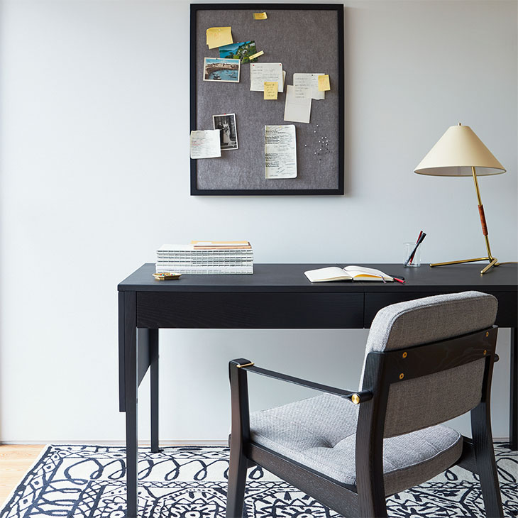 de la espada capo dining arm chair in a modern home office